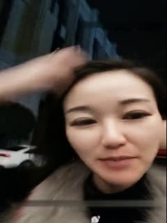 Sexy young woman kneels down to lick fans in outdoor park and then goes back to the hotel to fuck