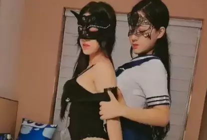 Two girls in sexy outfits lick each other and take turns giving oral sex and titjobs, very tempting!