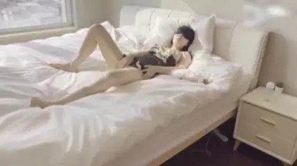 Young couple taking selfie in rental house